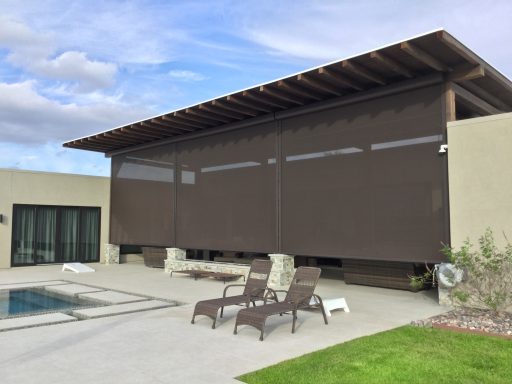 Large motorized screens, 23 feet wide by 14 feet tall, providing expansive coverage for outdoor spaces."

